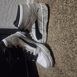 White and Black High-Top Sneakers